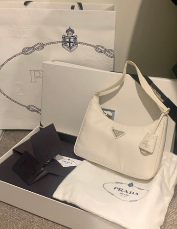 RAFFLE TICKET GIVEAWAY- PRADA RE EDITION NYLON BAG WHITE